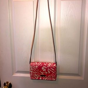 Kate spade mini purse with long strap and simple tropical coral and white print